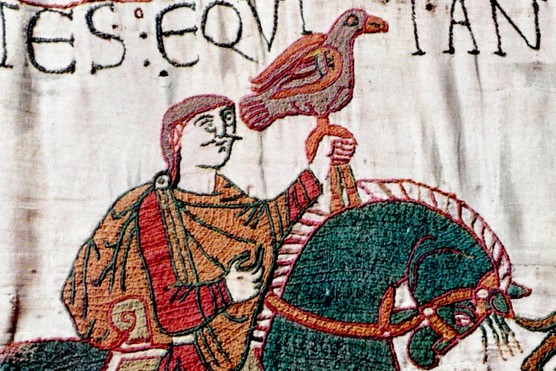 This scene comes from the Bayeux Tapestry, the nearly 70-metre-long embroidered narrative that chronicles the events leading to the Norman Conquest of England in 1066.