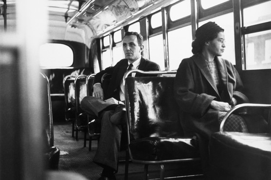 Rosa Parks shot to international fame when she refused to give in to a bus driver's demands that she relinquish her seat for a white person. (Bettmann via Getty Images) Rosa Parks Riding the Bus
