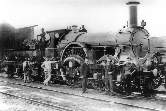 The 'Iron Duke' steam locomotive with railway workers