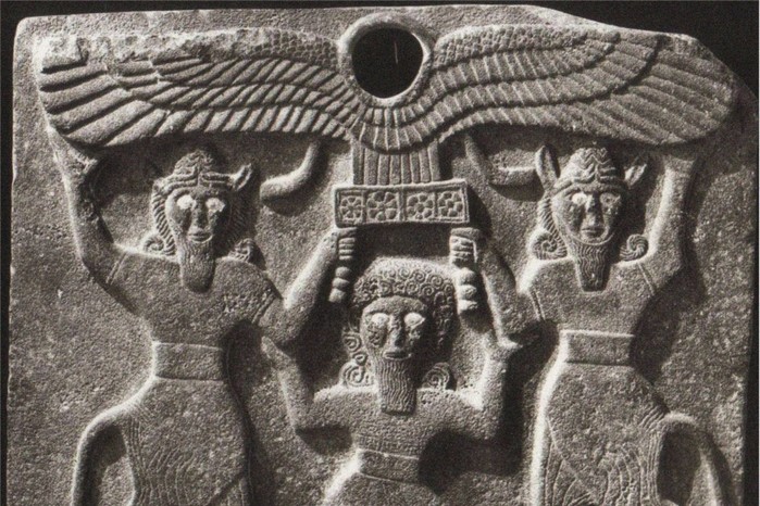 These 9th-century BC orthostates from Tell Halaf show the hero Gilgamesh flanked by two bull-headed demigods who raise a sun disc above him, imagery drawn from Mesopotamian myth. Gilgamesh was celebrated across the ancient Near East as a hero and semi-divine king, while bull-man figures and solar symbols evoked themes of power, protection, and cosmic order central to Mesopotamian religion.